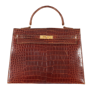 HERMES Paris circa 1960 Sac Kelly en crocodile havane   vendu 9 906,00 € le 10 juin